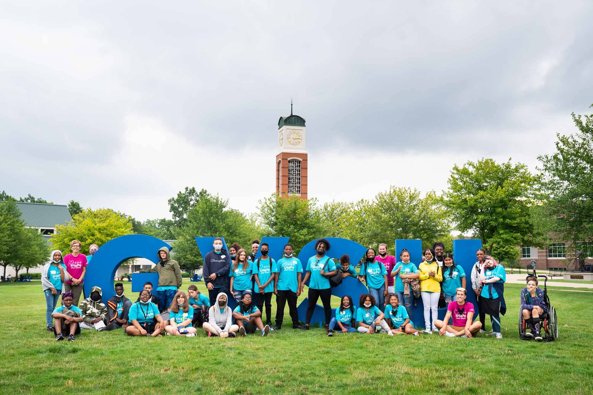 sHaPe Campers visit the GVSU Allendale campus and stand in front of the clock tower